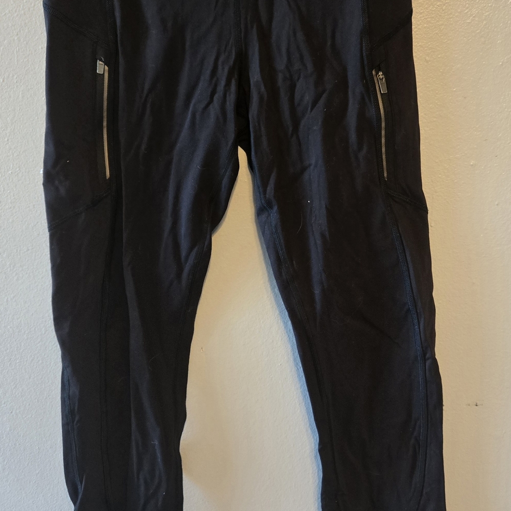 Athleta Rainier Black Leggings with Zipper Pockets